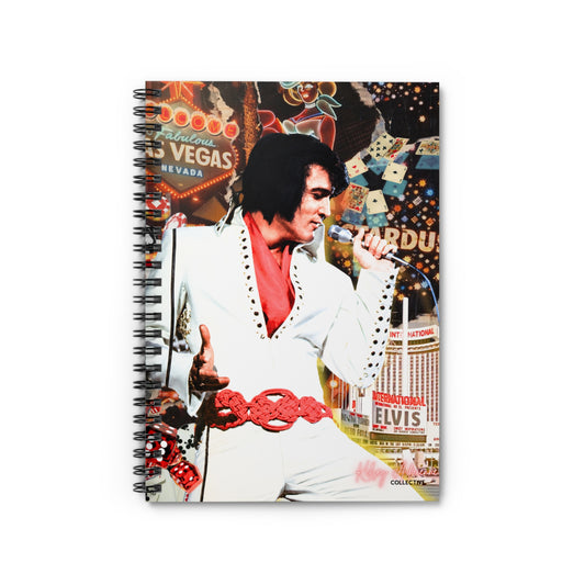 A spiral-bound notebook featuring a collage-style cover print of Elvis Presley in a white suit with a red shirt, surrounded by Las Vegas-themed graphics and signage, shown on a plain white background.